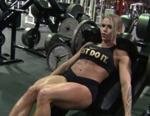 Ripped, vascular, tattooed female bodybuilder Larissa Reis works her muscular legs, glutes and calves on the gym's stair climber, then adds squats, leg presses and hack squats. Her pecs, biceps and abs are looking hot too. She's definitely stepping it up.