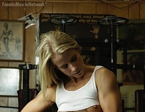 Claire's in the gym, posing to show you the mature muscles of her biceps, pecs, legs, abs and glutes, masturbating and playing with her ass. Look at her close-up as long as you want to. She likes it.