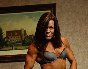 Female bodybuilder Tonya likes getting naked and posing for you to show you the mature muscles of her ripped abs, vascular biceps, pecs, glutes, and legs, and letting you see her tan lines, her pretty kitty, and her sweet ass. You'll like it too.