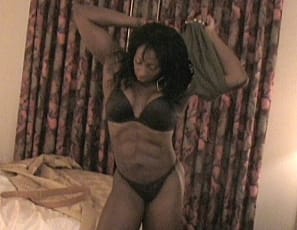Beautiful ebony female bodybuilder Shelly Fields is showing off her strong body in her hotel room. Shelly's powerful presence fills the room and every frame of this video. From her ripped abs, to the soles of her sexy feet we get to see every inch of the true ebony goddess.