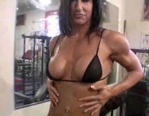 Bodybuilder Hot Italian works her biceps, poses, and admires herself in the mirror, then masturbates in extreme closeup, exclaiming, “It’s getting hot in here!” Wouldn’t you agree? And what’s your answer when she asks you, “Do you wanna see more?”
