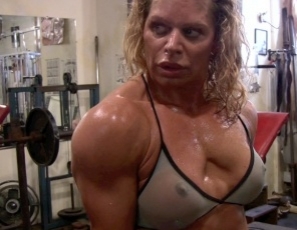 Bodybuilder Michelle Falsetta poses in the gym, stroking and massaging her powerful legs, glutes, abs and pecs and flexing her muscular biceps. Michelle is mature, but she’s stronger and sexier than ever – and that’s the truth.