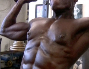 If you like muscles enormous and ebony, you’re going to want to watch bodybuilder Roxanne Edwards do her shoulder workout at the SheMuscle® gym, naked except for tiny black panties. Every inch of her is chiseled and vascular, from her eye-popping abs to her massive legs, pecs, biceps and glutes. And those shoulders? Get too close and you’ll need one to cry on.
