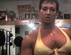“Do you like that I can bench 425, easy?” bodybuilder Tazzie Colomb asks in this video, flexing a 17” bicep in the gym. “Power is such a high – you have no idea.” Preparing for a powerlifting meet, she squats up to 315, but no higher – because she’s saving her strength for SheMuscleLive webcam. Yes, that means she could probably squat you. Any volunteers? 